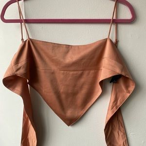 Danielle Bernstein S pink halter tie crop top